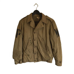 WWII M41 Field Jacket POW stencil, front view