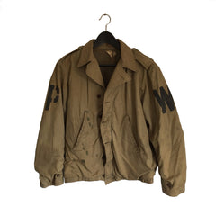 WWII M41 Field Jacket POW stencil, front view 